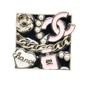CHANEL Gold Logo Brooch